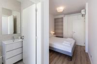 Postel nebo postele na pokoji v ubytování FLH Penha França Art Apartment