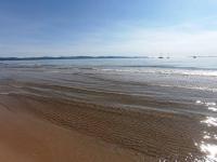 a beach with a body of water with waves at Presqu&#39;ile de Giens - Hameau de la Pinede in Hyères