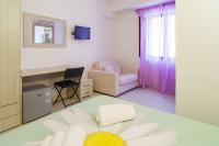 Posteľ alebo postele v izbe v ubytovaní Hotel La Marina