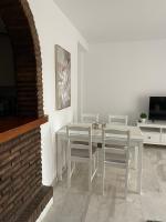 TV a/nebo společenská místnost v ubytování Jardines Apartment