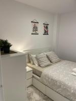 Postel nebo postele na pokoji v ubytování Jardines Apartment