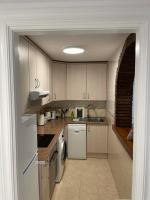 Kuchyň nebo kuchyňský kout v ubytování Jardines Apartment