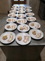 a table full of plates of food with animals on them at Appartamento del Monastero in Dronero