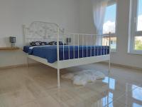 Postel nebo postele na pokoji v ubytování Mandre Duplex Apartment
