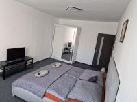 Postel nebo postele na pokoji v ubytování Apartmán U Petra
