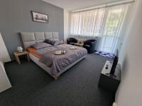 Postel nebo postele na pokoji v ubytování Apartmán U Petra