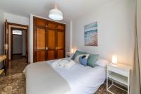 Postel nebo postele na pokoji v ubytování Ático vista mar Los Cristianos