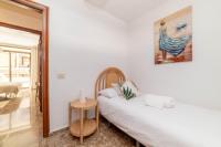 Postel nebo postele na pokoji v ubytování Ático vista mar Los Cristianos