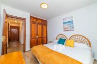 Postel nebo postele na pokoji v ubytování Ático vista mar Los Cristianos