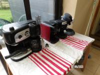 a coffee maker sitting on top of a table at Calme de la campagne in Le Torp-Mesnil