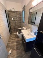 Koupelna v ubytování Comfy Kourouta Apartment & Suite
