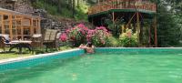 Kudrat - A Boutique Homestay- Tirthan Valleyの敷地内または近くにあるプール