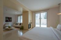A bed or beds in a room at Casa dell'Arte Hotel of Arts & Leisure