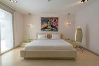 A bed or beds in a room at Casa dell'Arte Hotel of Arts & Leisure