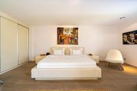 A bed or beds in a room at Casa dell'Arte Hotel of Arts & Leisure