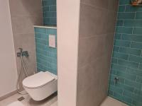 Kúpeľňa v ubytovaní Beachfront Comfort Apartments SINAJKO