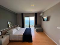 Posteľ alebo postele v izbe v ubytovaní Beachfront Comfort Apartments SINAJKO