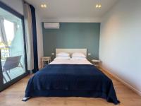 Posteľ alebo postele v izbe v ubytovaní Beachfront Comfort Apartments SINAJKO