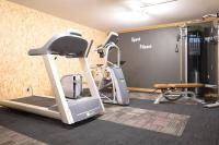 a room with a gym with a treadmill at HaKaJu Appartement 10 personnes à Val Cenis in Lanslebourg-Mont-Cenis