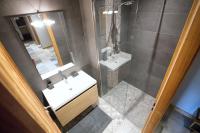 an overhead view of a bathroom with a sink and shower at HaKaJu Appartement 10 personnes à Val Cenis in Lanslebourg-Mont-Cenis