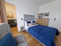 Posteľ alebo postele v izbe v ubytovaní P&A APARTAMENT