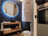 Koupelna v ubytování SUITE HAUS BAHIA