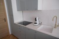 Kuchyňa alebo kuchynka v ubytovaní Appartement de beau standing
