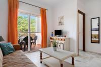 Televízia a/alebo spoločenská miestnosť v ubytovaní Apartamento Mediterraneo 105