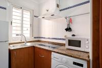 Kuchyňa alebo kuchynka v ubytovaní Apartamento Mediterraneo 105