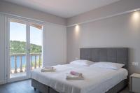 Posteľ alebo postele v izbe v ubytovaní Panoramic Apartments Anić