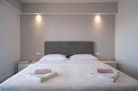 Posteľ alebo postele v izbe v ubytovaní Panoramic Apartments Anić