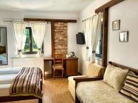 Posteľ alebo postele v izbe v ubytovaní Etno Garden Exclusive Rooms
