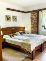 Posteľ alebo postele v izbe v ubytovaní Etno Garden Exclusive Rooms
