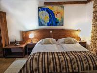 Posteľ alebo postele v izbe v ubytovaní Etno Garden Exclusive Rooms