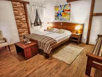 Posteľ alebo postele v izbe v ubytovaní Etno Garden Exclusive Rooms