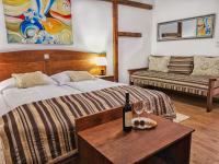 Posteľ alebo postele v izbe v ubytovaní Etno Garden Exclusive Rooms