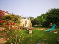 Vonkajšia záhrada v ubytovaní Maison de campagne proche Libourne