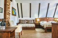 Posteľ alebo postele v izbe v ubytovaní Etno Garden Exclusive Rooms