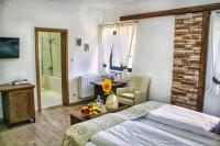 Posteľ alebo postele v izbe v ubytovaní Etno Garden Exclusive Rooms