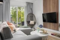Telewizja i/lub zestaw kina domowego w obiekcie Porta Mare Apartments LuxView III