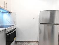 Kuchyň nebo kuchyňský kout v ubytování Super Paradise Apartments