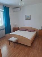 Posteľ alebo postele v izbe v ubytovaní Apartments with a parking space Brela, Makarska - 18495
