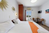 Posteľ alebo postele v izbe v ubytovaní Aigaiou Avra Apartments