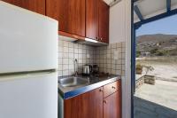 Kuchyňa alebo kuchynka v ubytovaní Aigaiou Avra Apartments