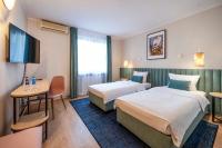 Posteľ alebo postele v izbe v ubytovaní Hotel H12****