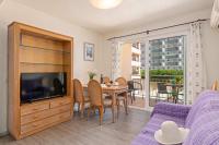 A television and/or entertainment centre at Apartamento Arenal 3 - PlusHolidays