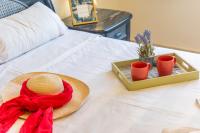 A bed or beds in a room at Apartamento Arenal 3 - PlusHolidays