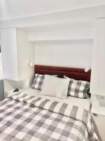 Postel nebo postele na pokoji v ubytování Costa Apartments