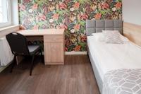 Łóżko lub łóżka w pokoju w obiekcie Hotel 107