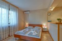 Posteľ alebo postele v izbe v ubytovaní Apartment Vilma Funtana